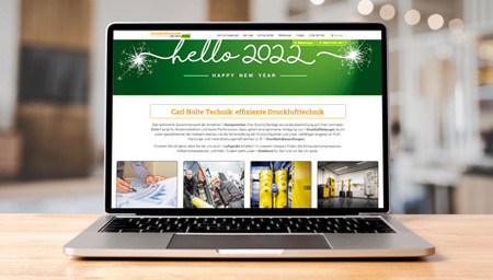 Laptop mit Website der Drucklufttechnik der Carl Nolte Technik, Hintergrund unscharf