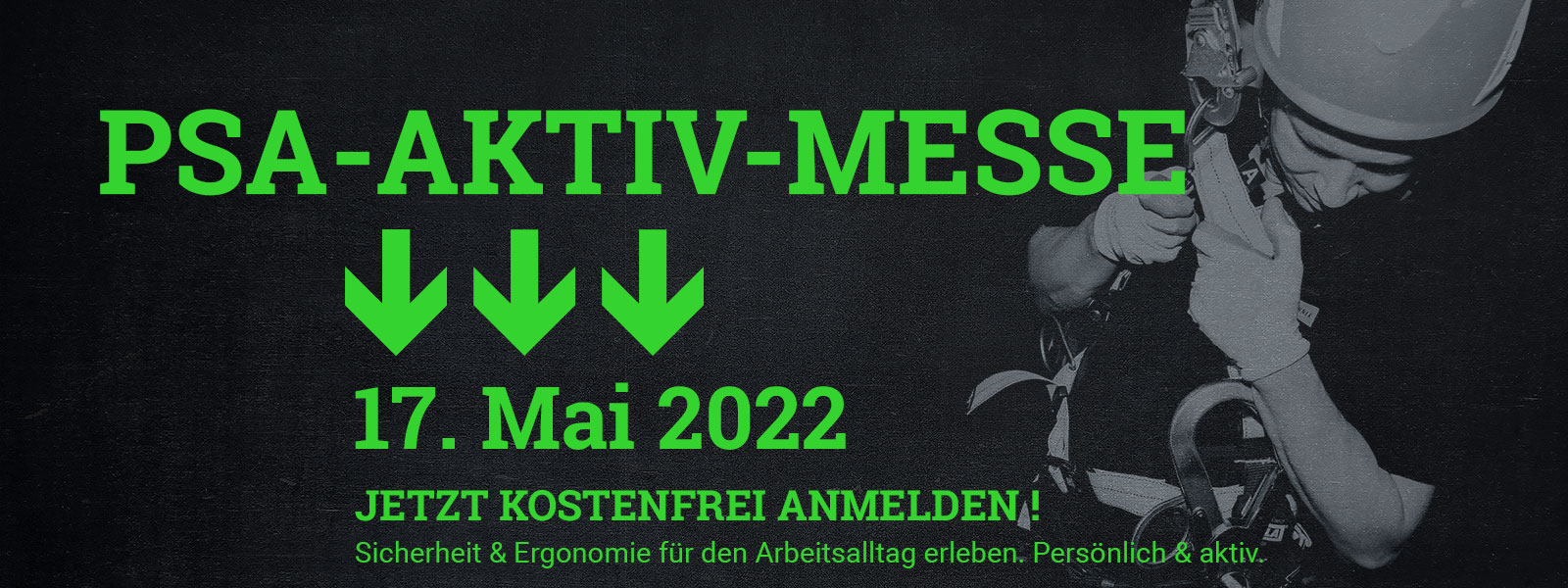 Mann mit Helm und Handschuhen in Sicherheitsgurt, grüner Text mit Einladung zur PSA-Aktiv-Messe am 17. Mai 2022