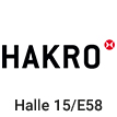 Logo der Firma Hakro, schwarze Schrift mit einem roten Kreis rechts oben, Text mit Halle und Standnummer für eine Messe